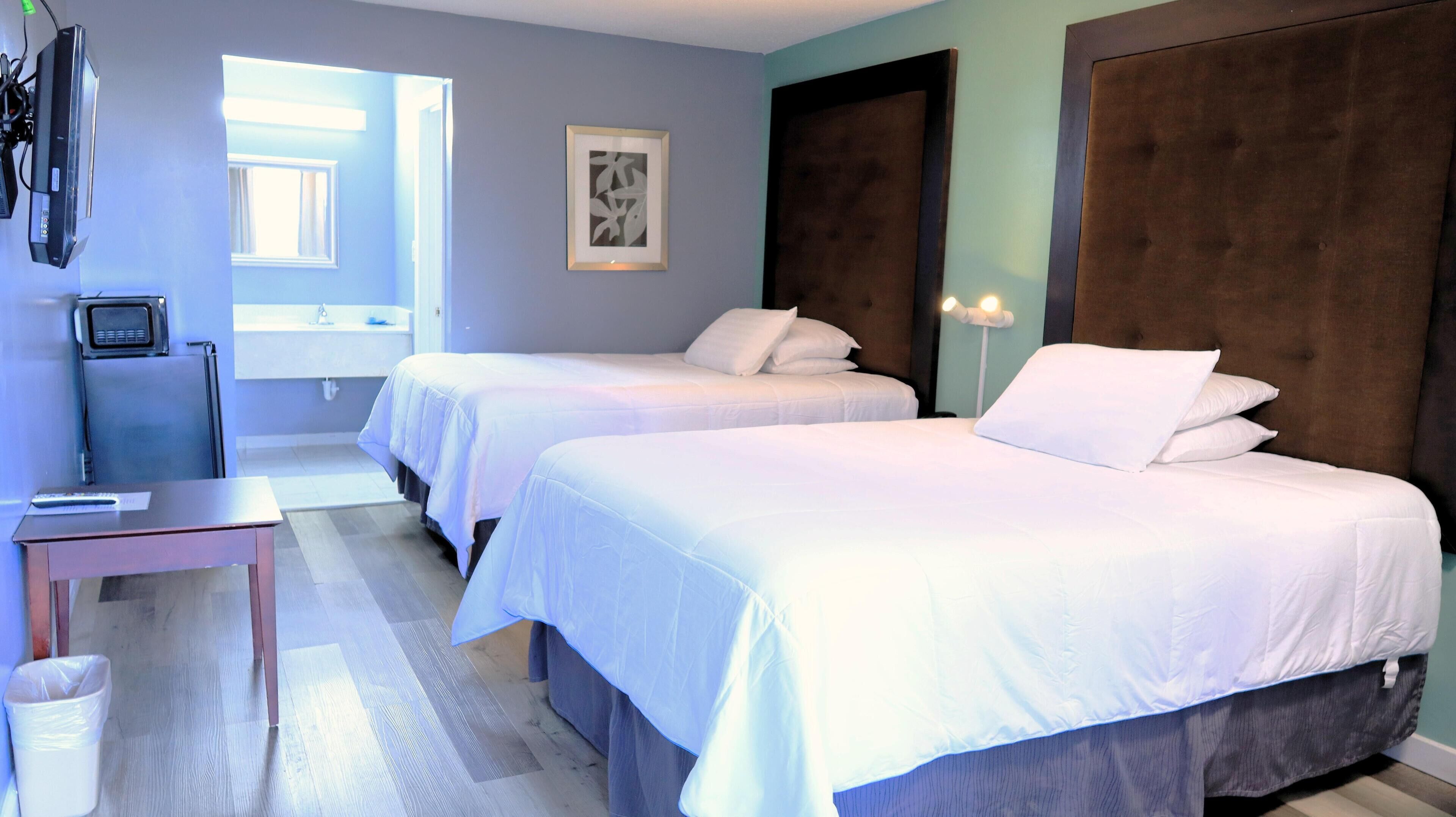 Egyptian cotton sheets, premium bedding, down duvets, pillow-top beds