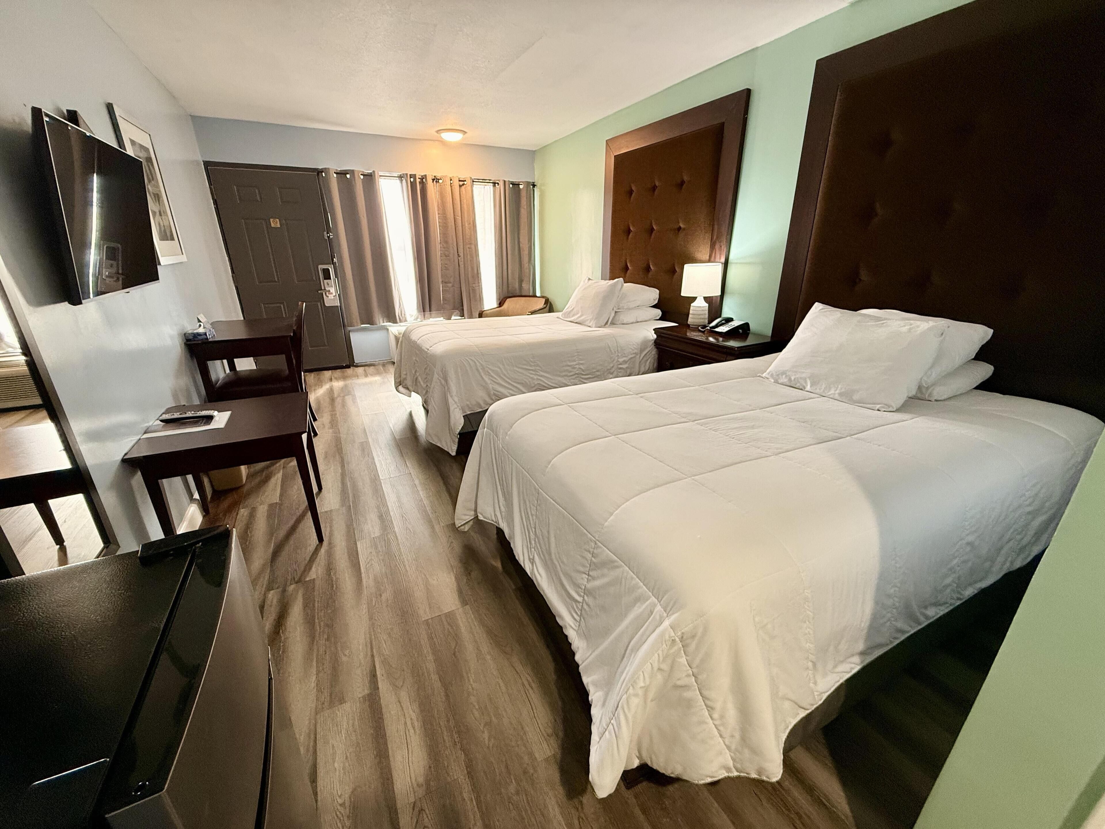 Down duvets, pillow-top beds, individually furnished, desk