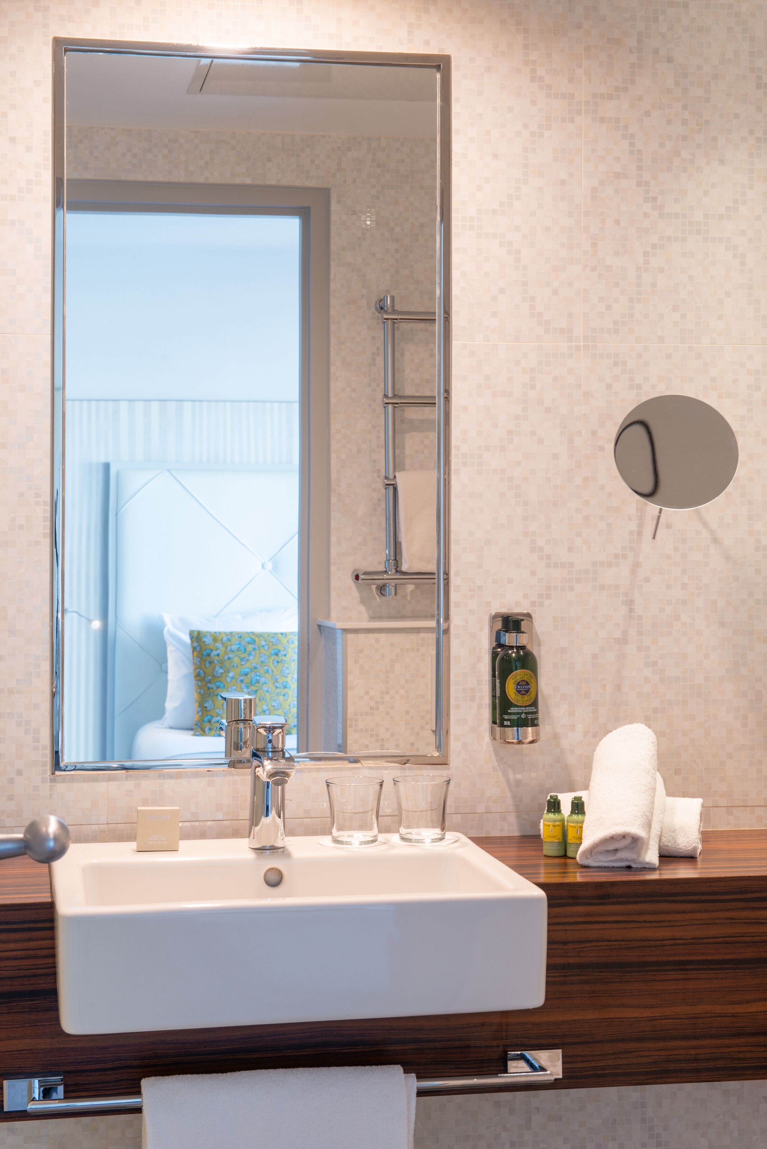 shower, designer toiletries, hair dryer, towels