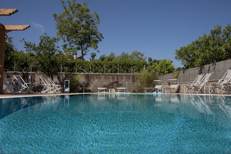 Outdoor pool, sun loungers