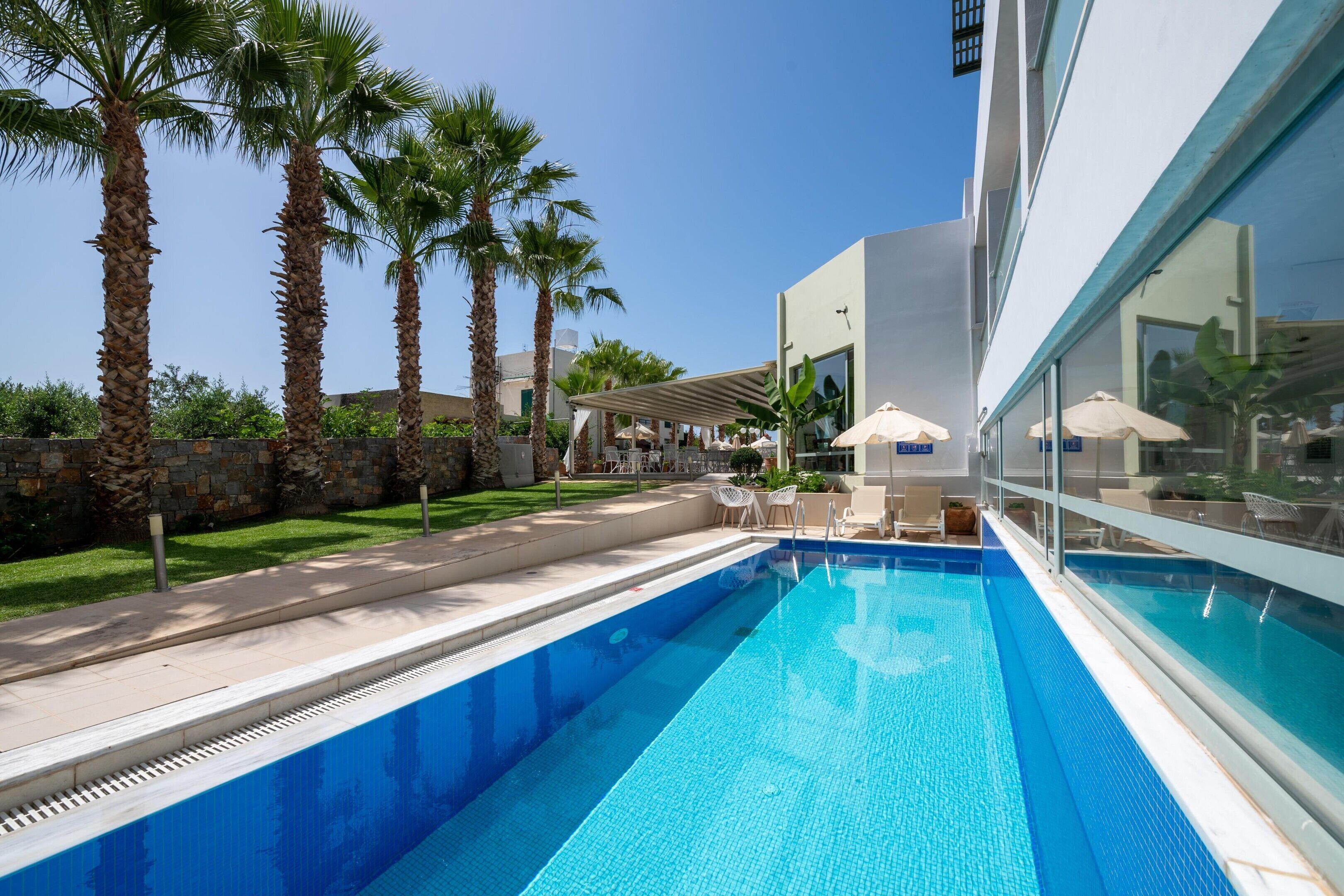 3 outdoor pools, open 9 AM to 7 PM, pool umbrellas, pool loungers