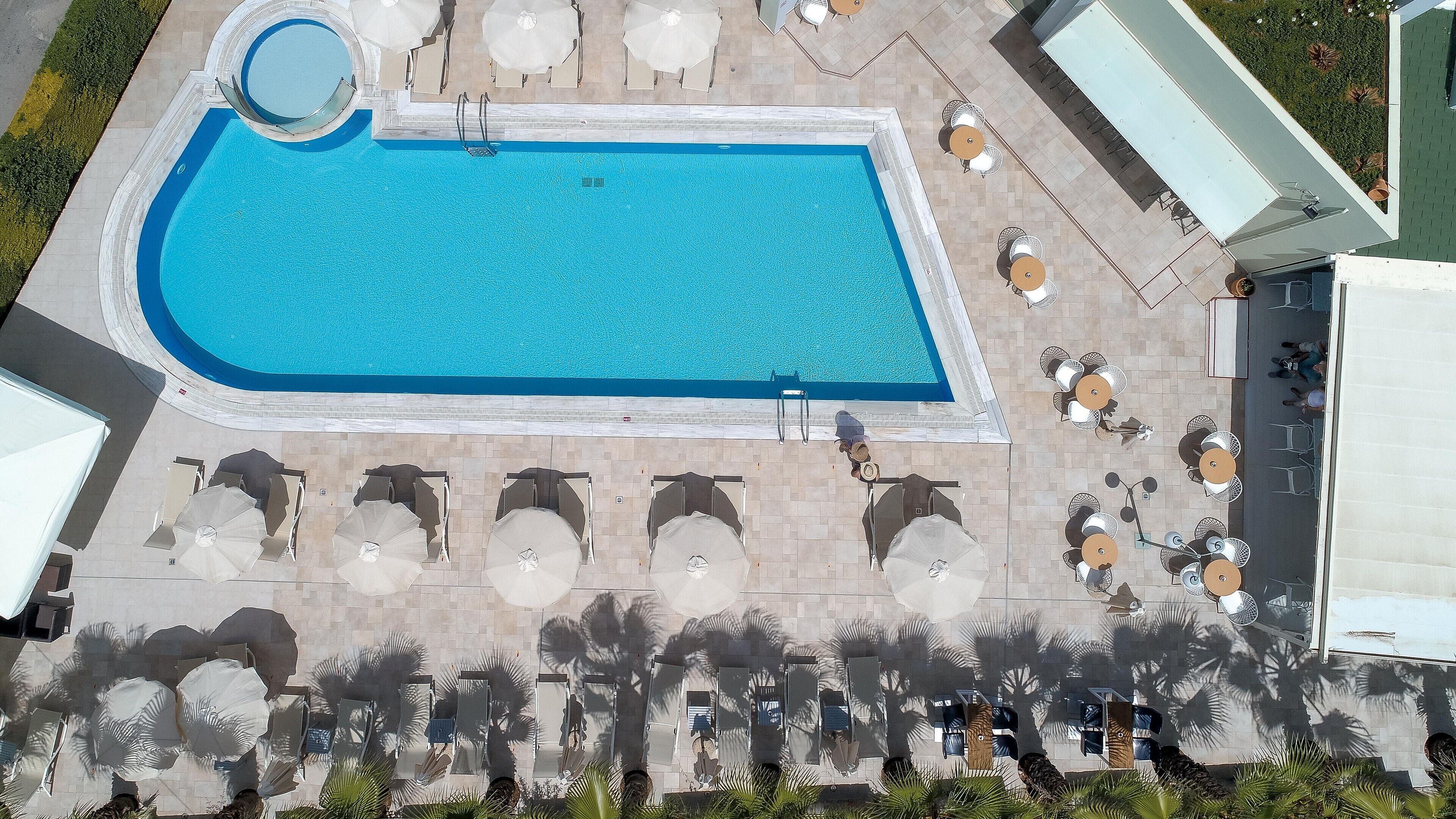 3 outdoor pools, open 9 AM to 7 PM, pool umbrellas, sun loungers