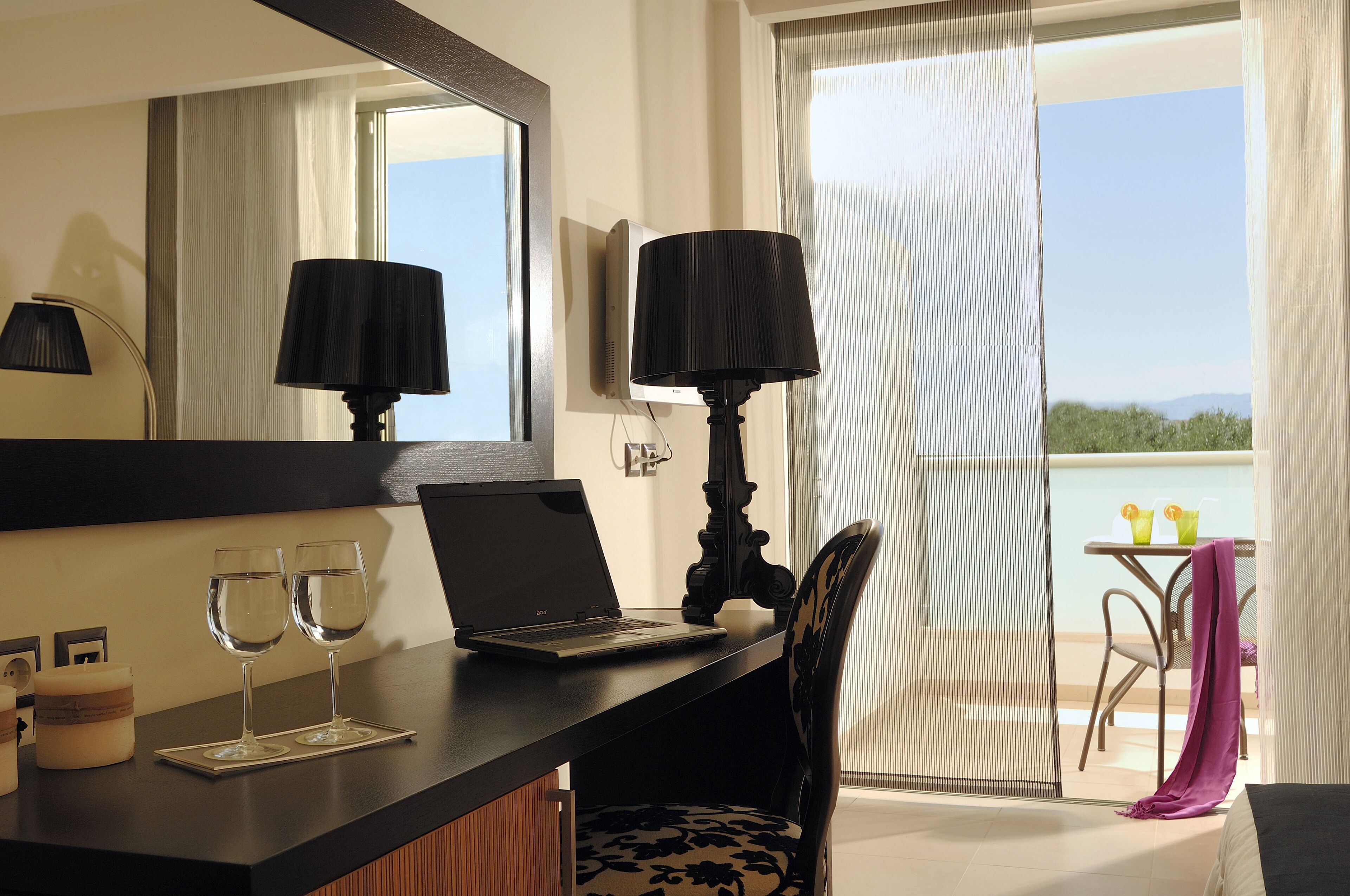 junior suite with balcony & view | in-room safe, desk, blackout curtains, soundproofing