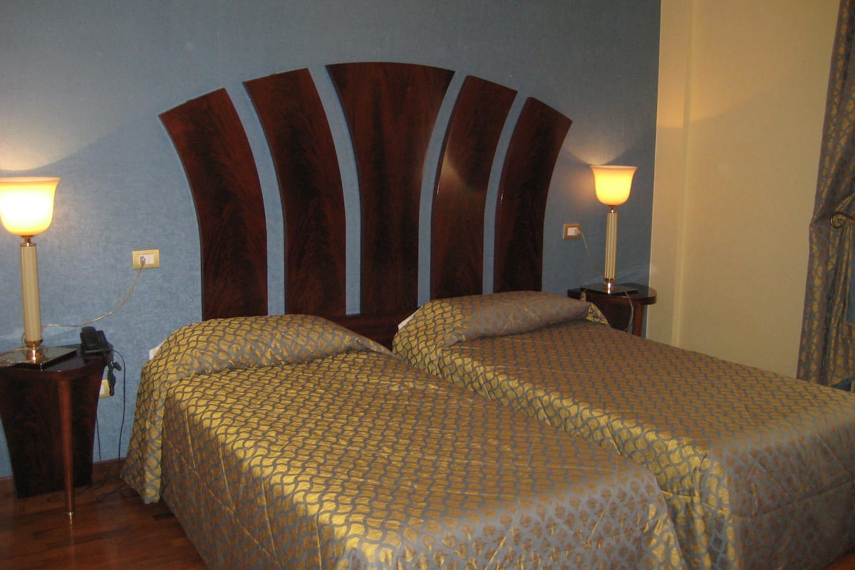 Premium bedding, down duvets, minibar, in-room safe