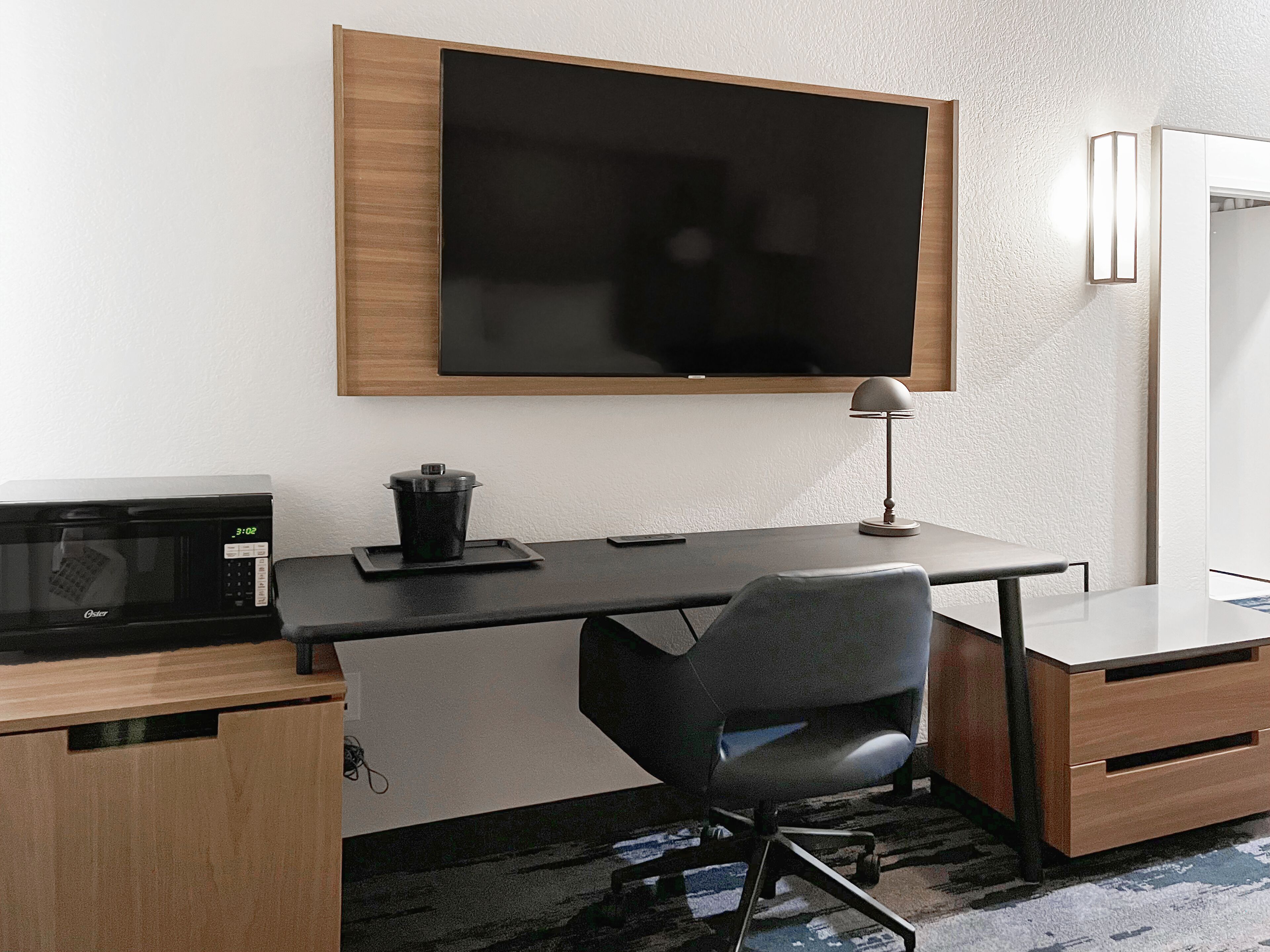 desk, laptop workspace, blackout curtains, iron/ironing board