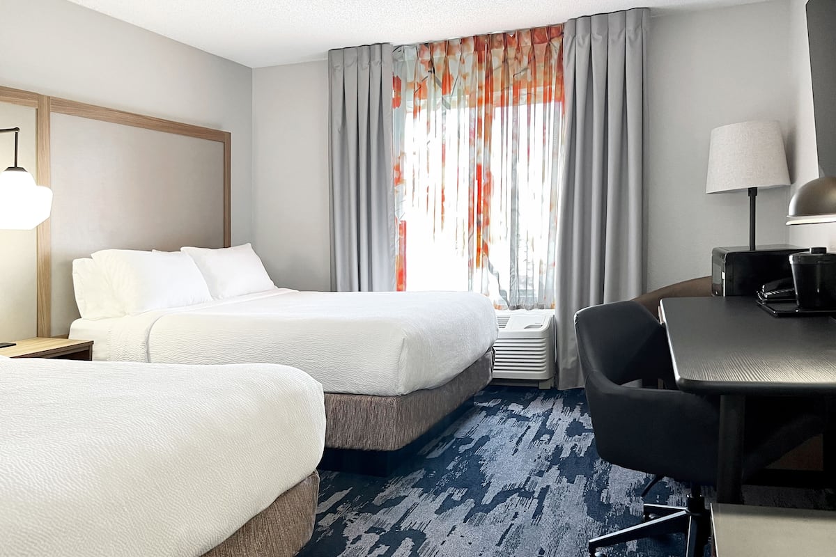 desk, laptop workspace, blackout curtains, iron/ironing board