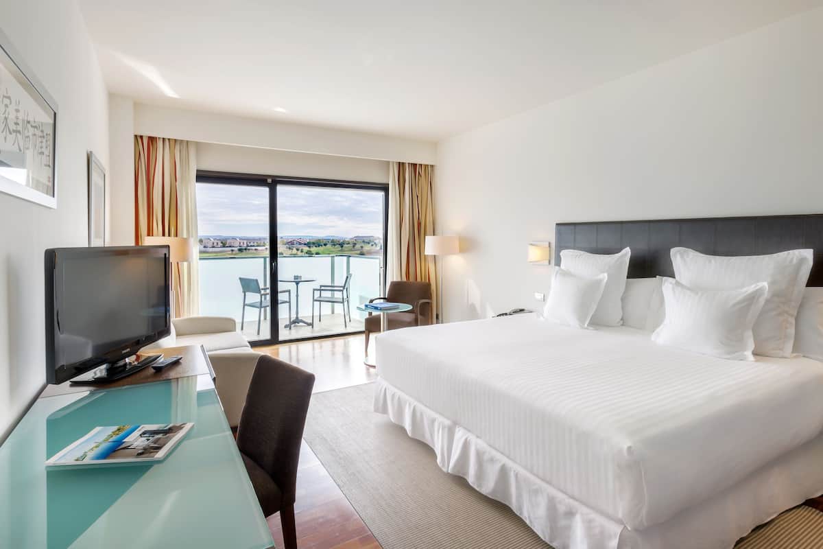 hypo-allergenic bedding, down duvets, pillow-top beds, in-room safe