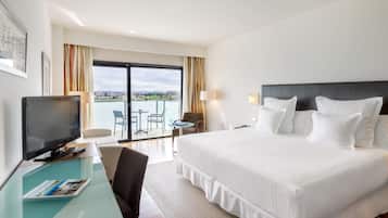Hypo-allergenic bedding, down duvets, pillow-top beds, in-room safe