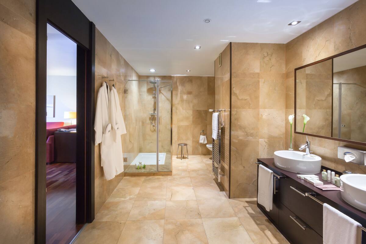 separate bathtub and shower, eco-friendly toiletries, hair dryer, bidet