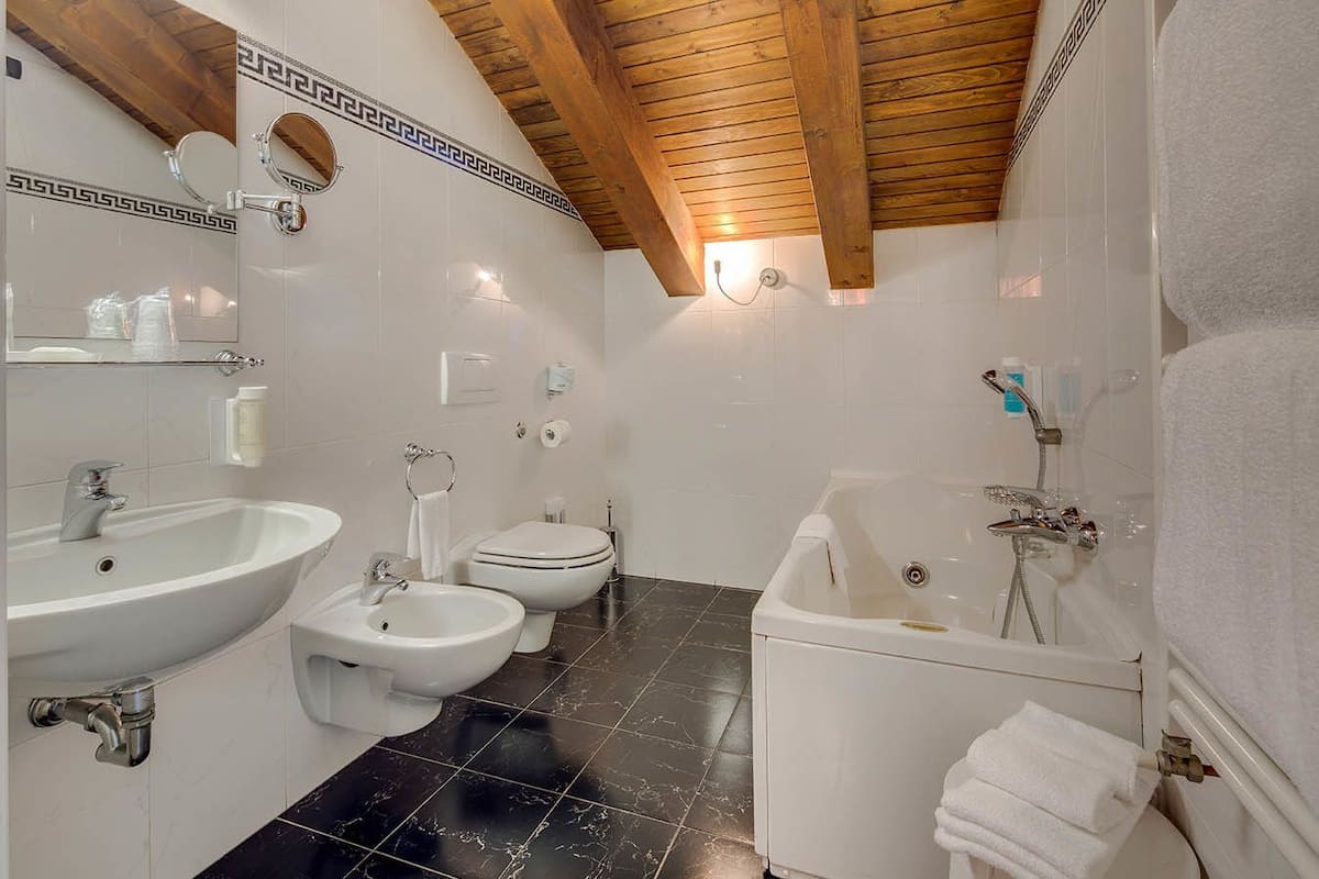 Family Room (with sofa bed) | Bathroom | Shower, hair dryer, slippers, bidet