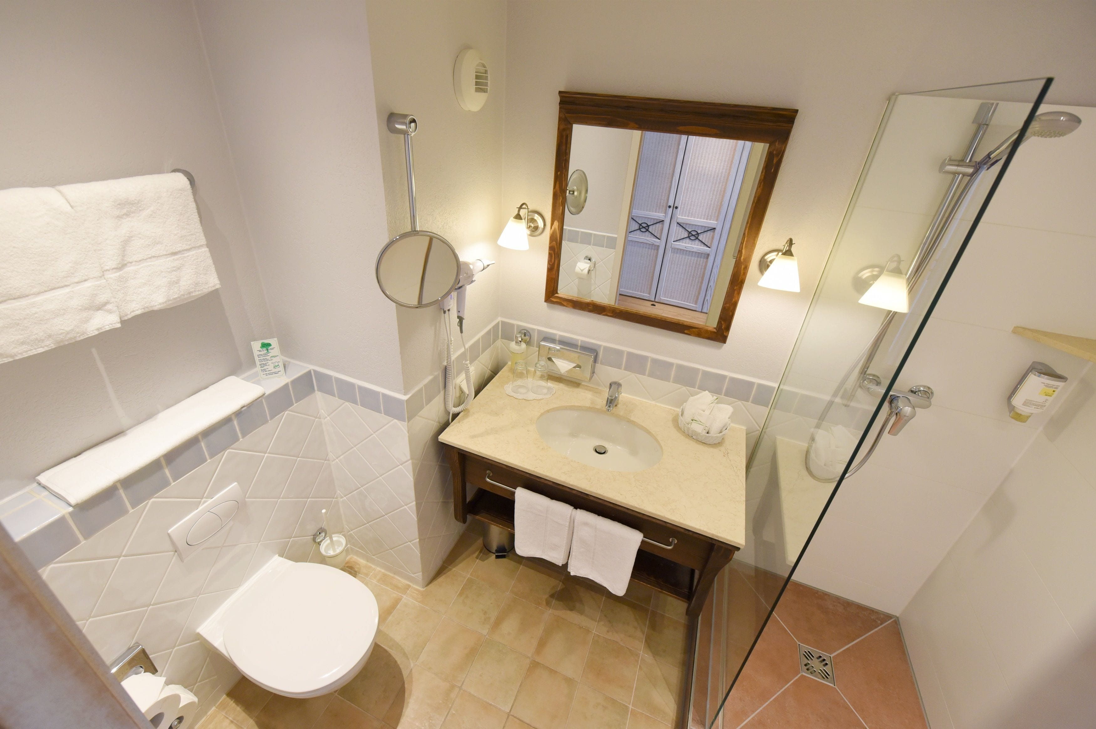 free toiletries, hair dryer, bathrobes, slippers