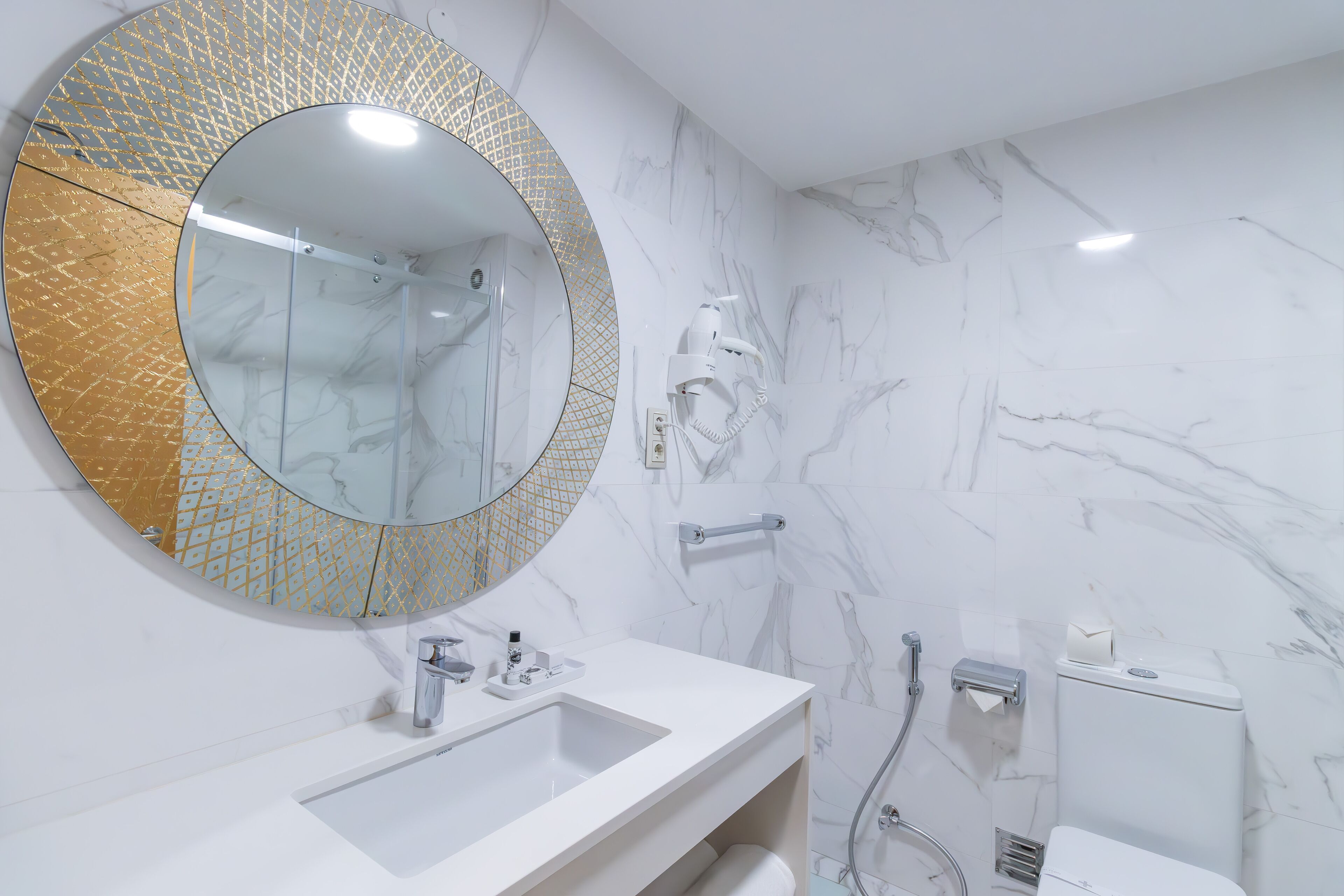 free toiletries, hair dryer, towels, shampoo