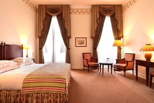 Superior Double or Twin Room | Minibar, in-room safe, desk, blackout drapes