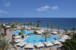 Indoor pool, seasonal outdoor pool, pool umbrellas, pool loungers