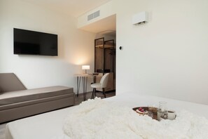 Superior Triple Room | Minibar, in-room safe, desk, laptop workspace