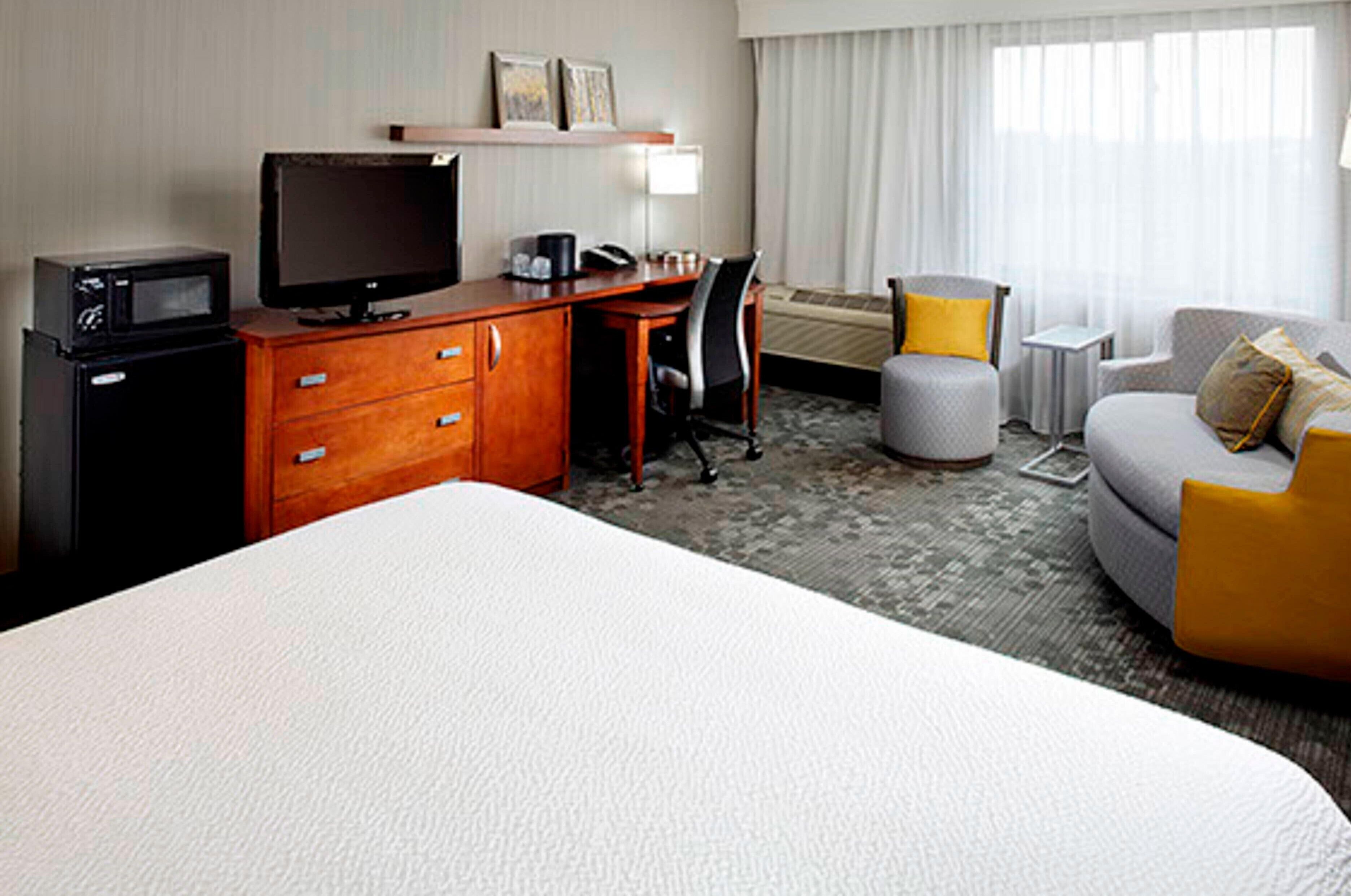 pillow-top beds, desk, blackout curtains, iron/ironing board