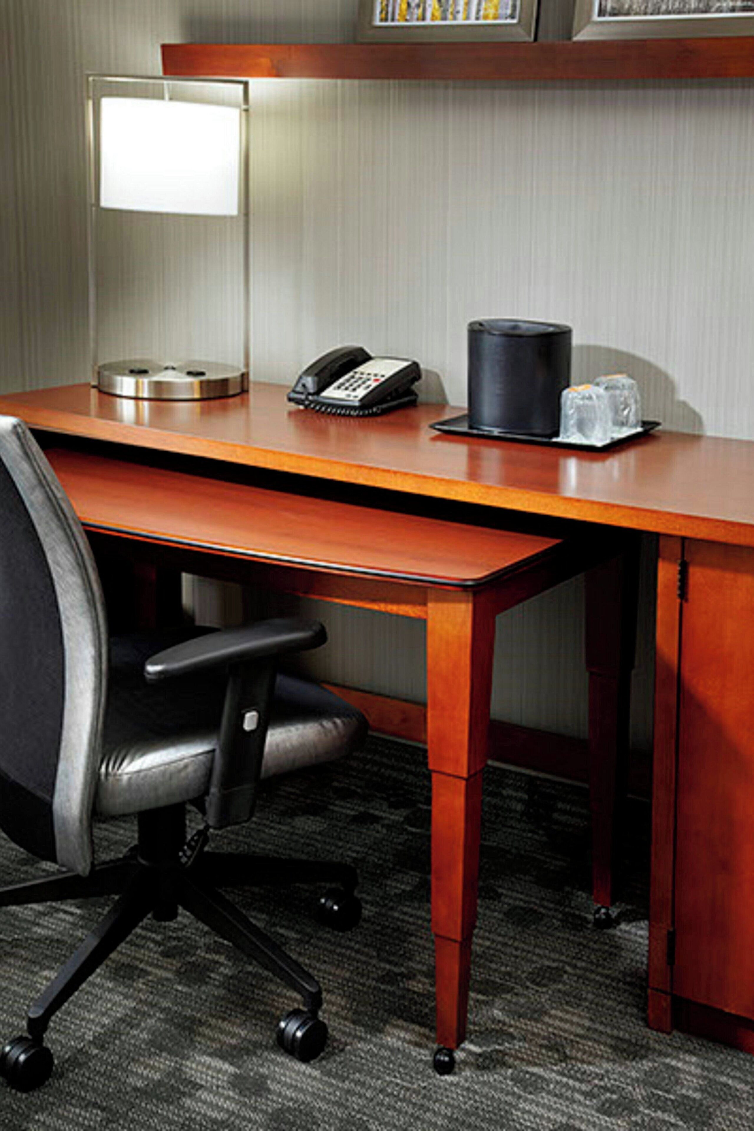 pillow-top beds, desk, blackout curtains, iron/ironing board