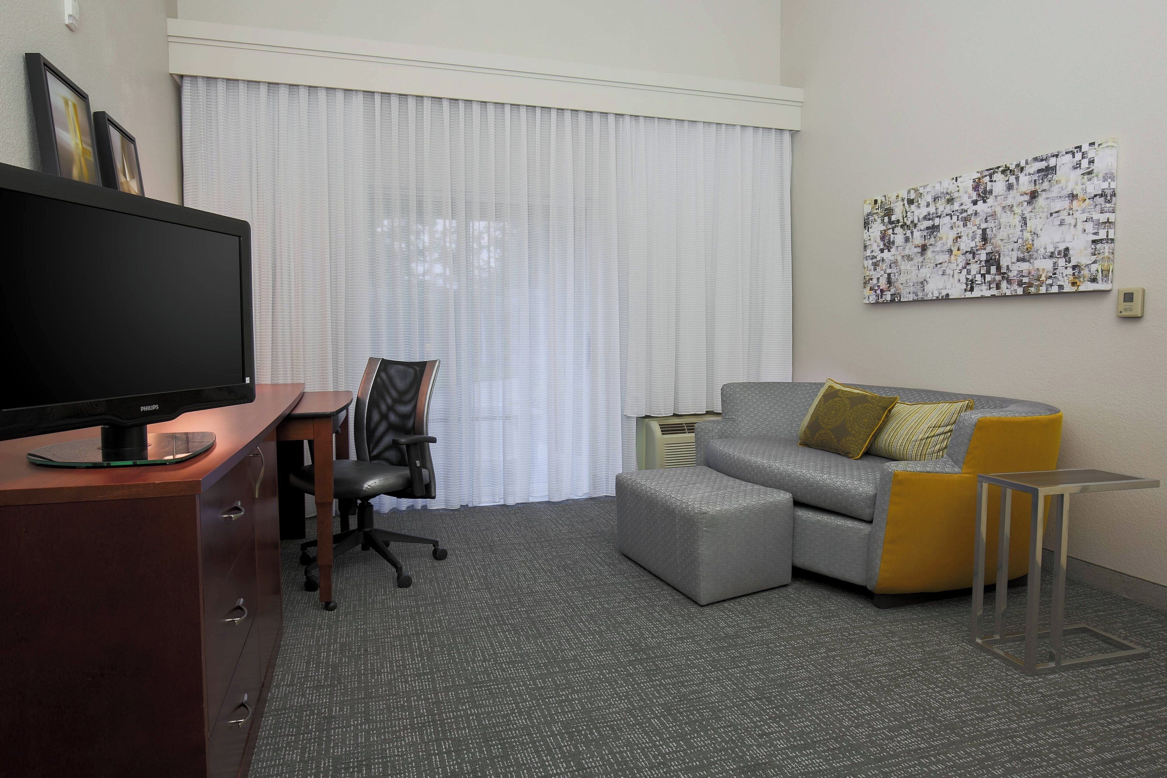 Suite ejecutiva, 1 cama King size y sofá cama | Área de sala de estar