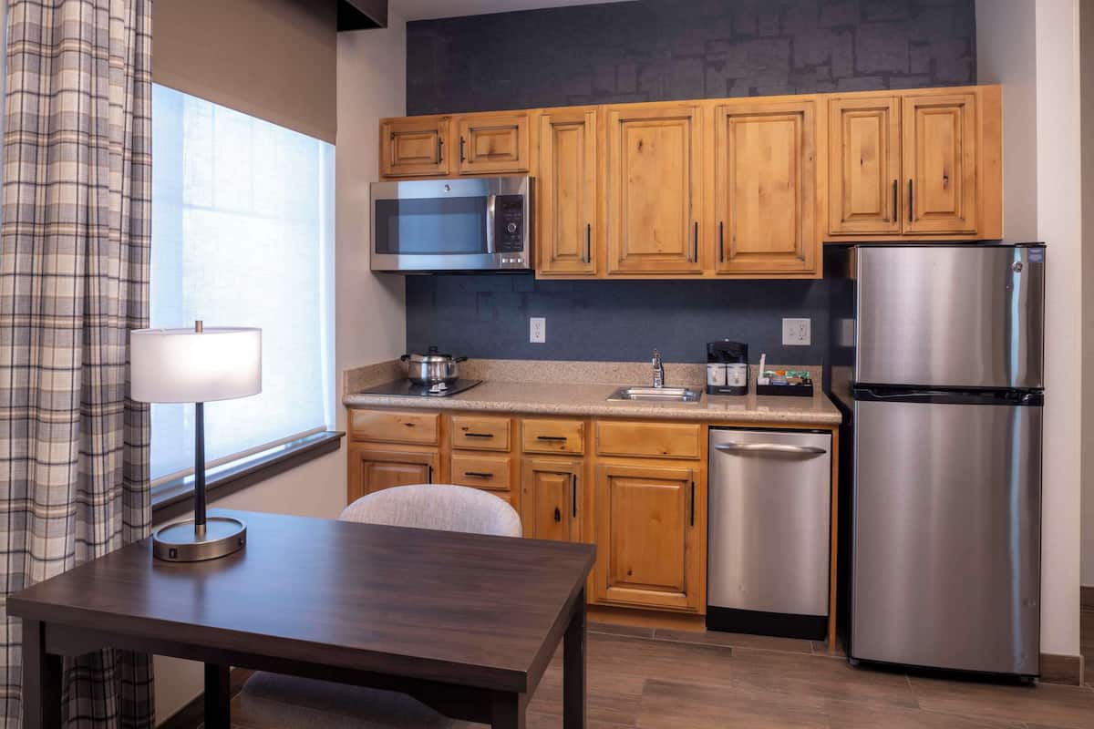 suite, 1 bedroom, fireplace | private kitchen | full-sized fridge, microwave, coffee/tea maker