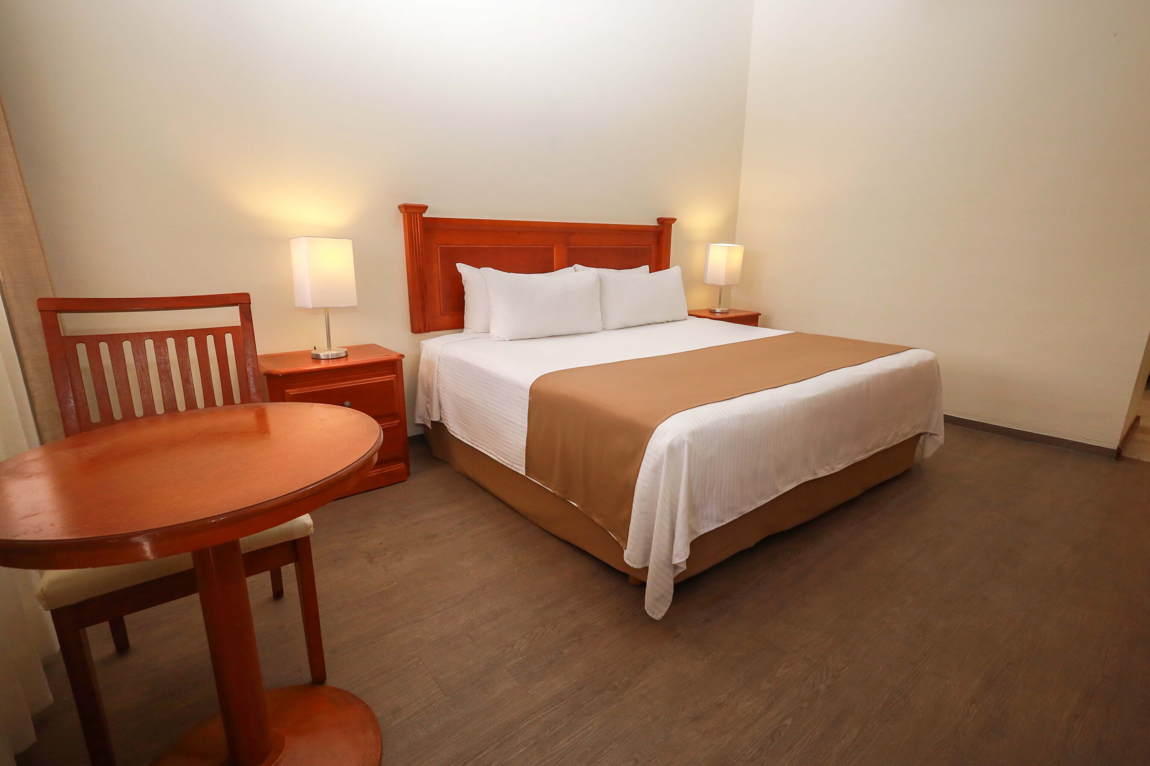 superior room, 1 king bed | in-room safe, desk, laptop workspace, blackout curtains