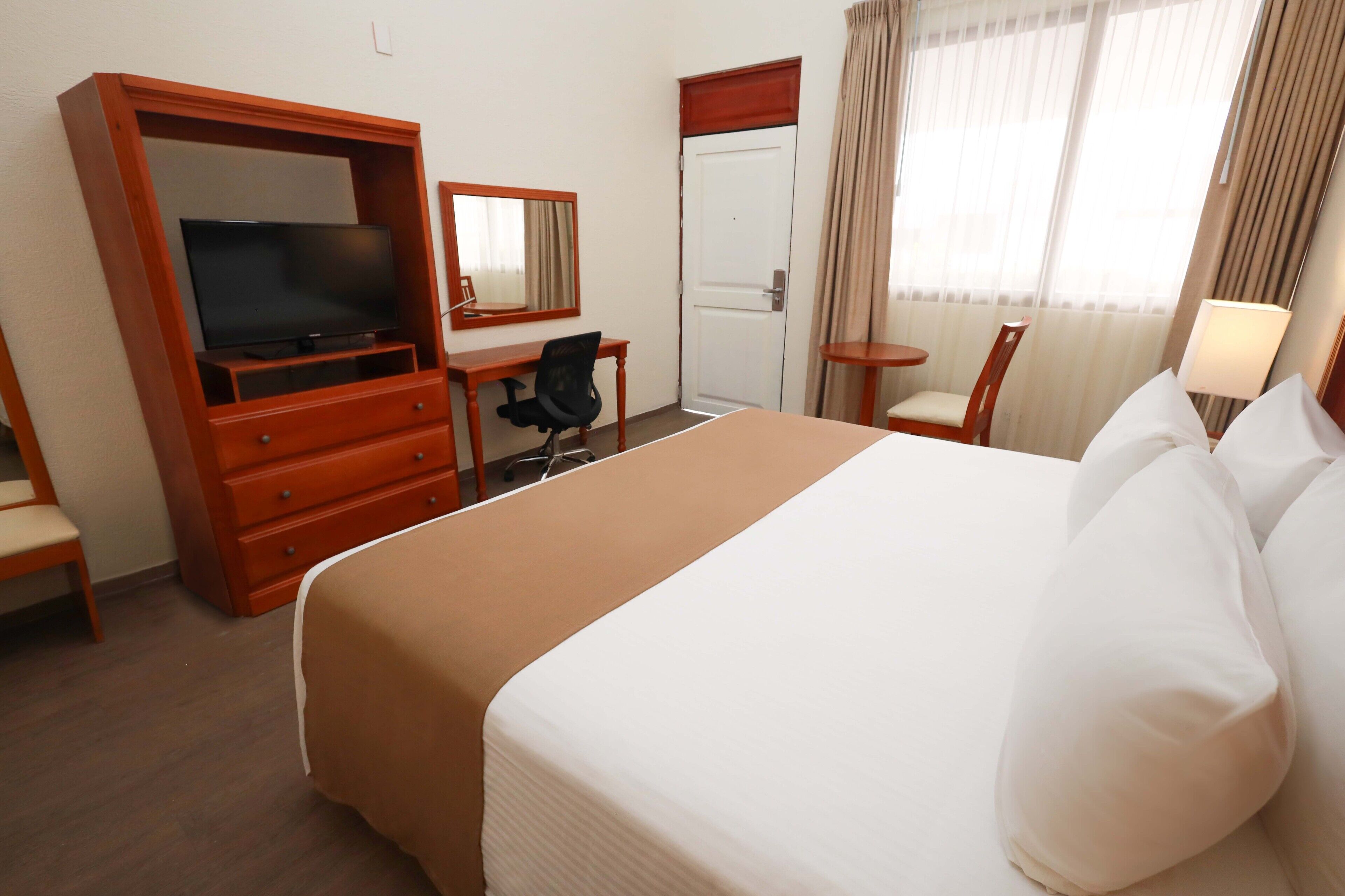 superior room, 1 king bed | in-room safe, desk, laptop workspace, blackout curtains