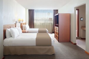 Junior Suite, 2 Double Beds | In-room safe, desk, laptop workspace, blackout drapes
