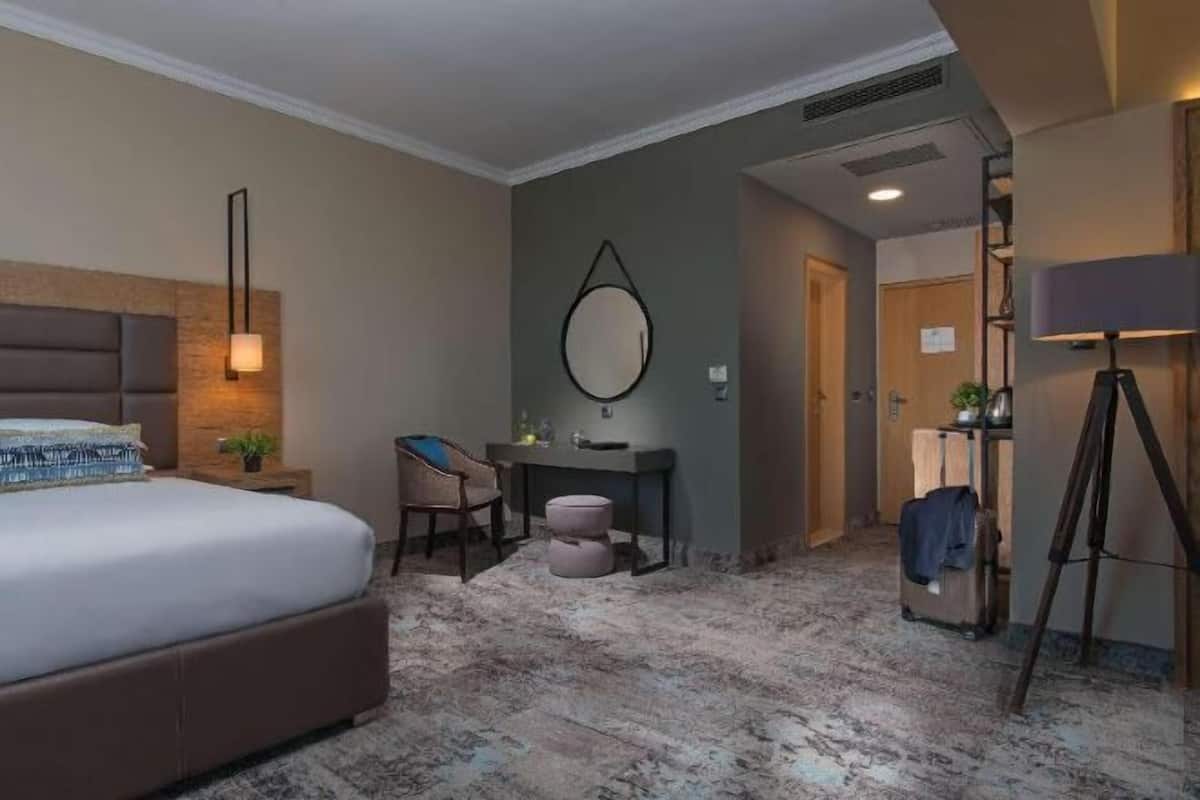 Premium bedding, memory foam beds, minibar, in-room safe