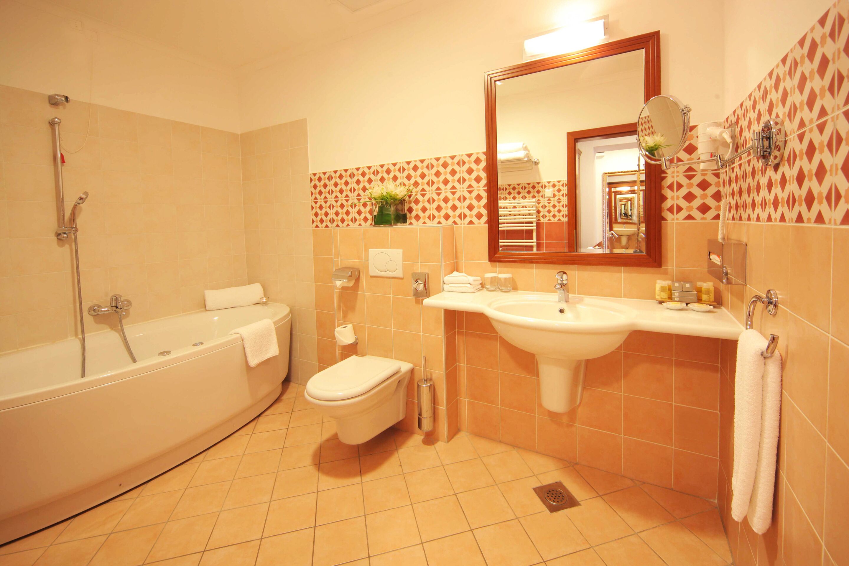 family suite | bathroom | combined shower/bathtub, free toiletries, hair dryer, bathrobes