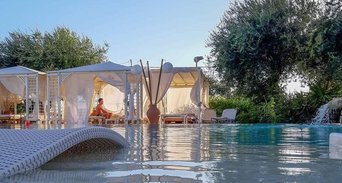 outdoor pool, pool umbrellas, pool loungers