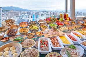 Indulge in a city view while enjoying a buffet-style meal.
