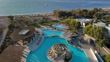 2 outdoor pools, pool umbrellas, pool loungers