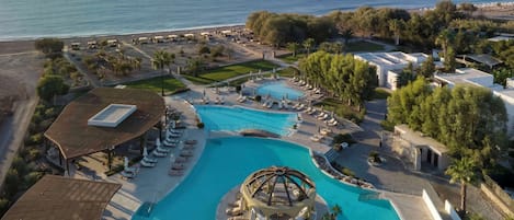 2 outdoor pools, pool umbrellas, sun loungers