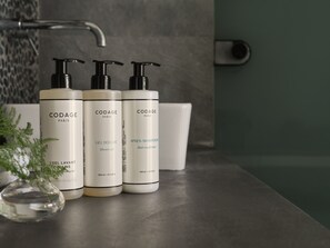 KING BEACH FRONT STE-POOL | Bathroom | Designer toiletries, hair dryer, bathrobes, slippers - Aulus Lindos Rhodes, All-Inclusive Resort, Curio Collection by Hilton (Rhodes)