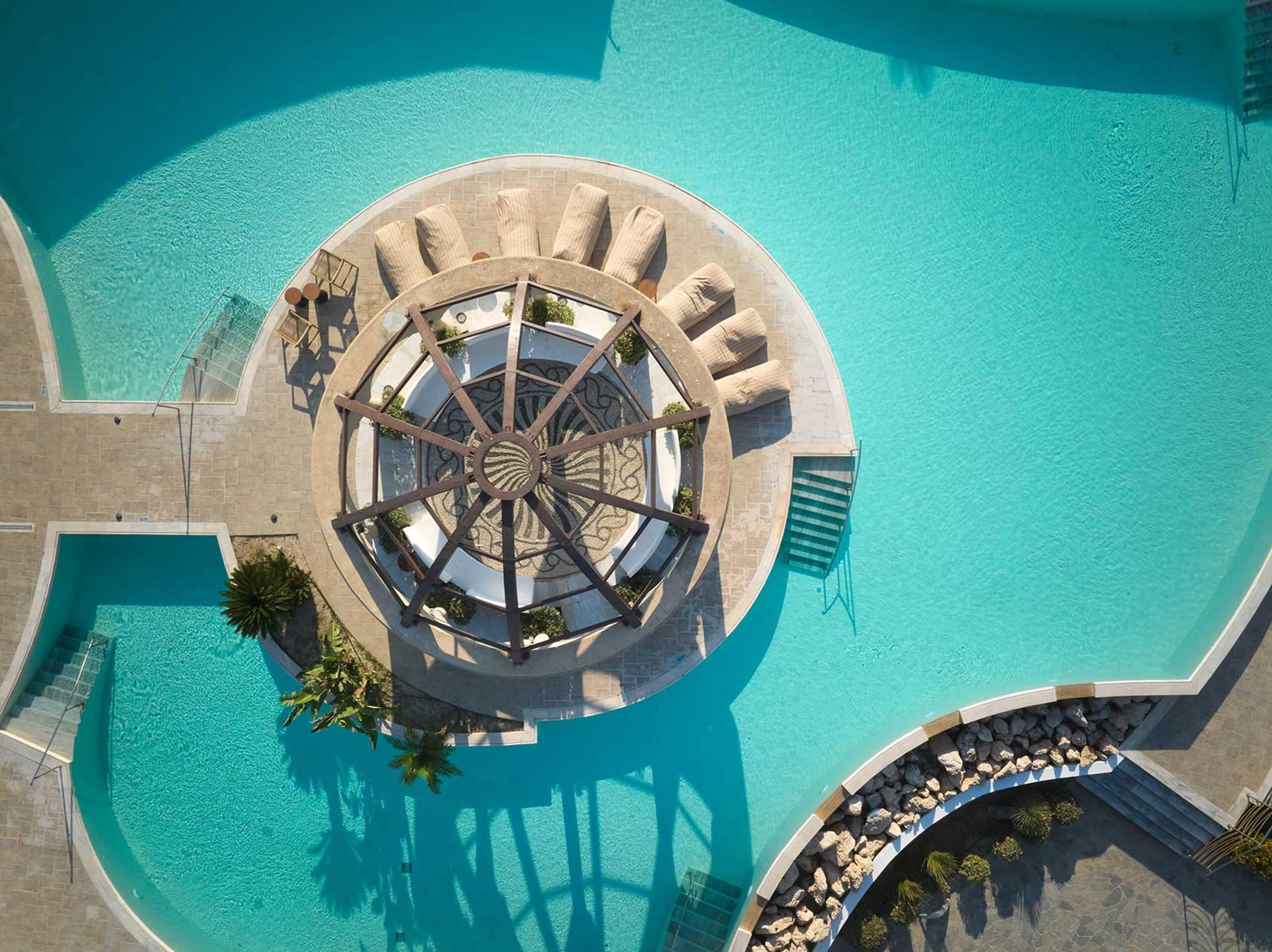 Seasonal outdoor pool, pool umbrellas, pool loungers