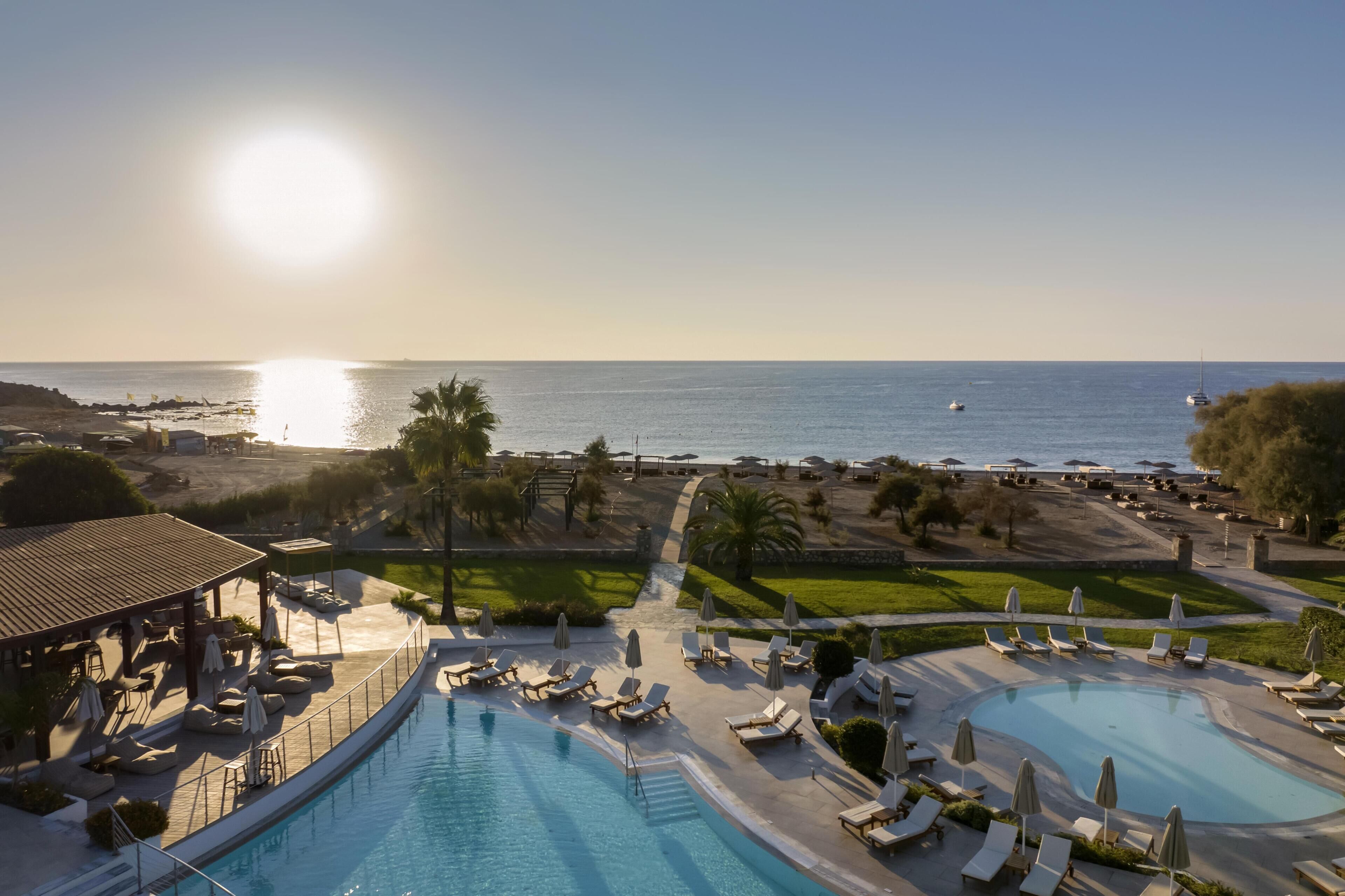 Seasonal outdoor pool, pool umbrellas, pool loungers