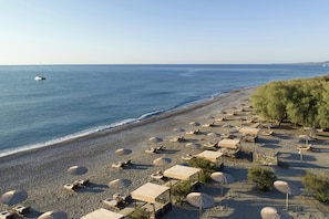 Private beach, sun loungers, beach umbrellas, beach towels - Aulus Lindos Rhodes, All-Inclusive Resort, Curio Collection by Hilton (Rhodes)