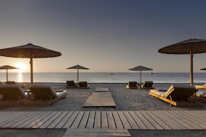 Private beach, sun loungers, beach umbrellas, beach towels - Aulus Lindos Rhodes, All-Inclusive Resort, Curio Collection by Hilton (Rhodes)