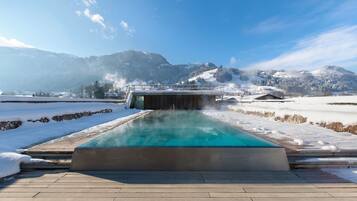 Indoor pool, outdoor pool, open 8 AM to 8 PM, pool umbrellas