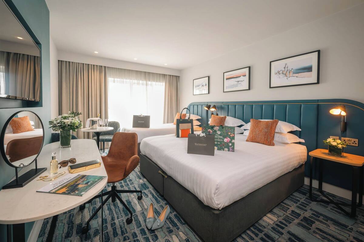 superior triple room | 1 bedroom, in-room safe, desk, laptop workspace