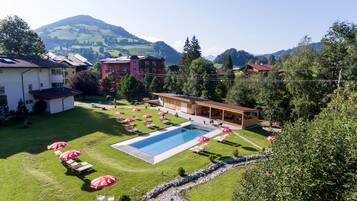 2 indoor pools, seasonal outdoor pool, pool umbrellas, pool loungers