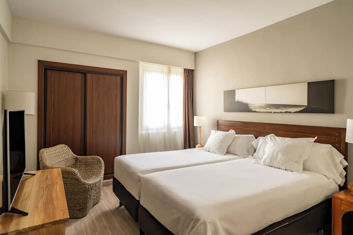 Ropa de cama de alta calidad, edredón y minibar