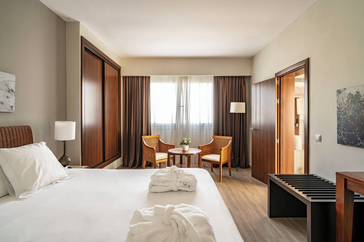 premium bedding, down duvets, minibar, in-room safe