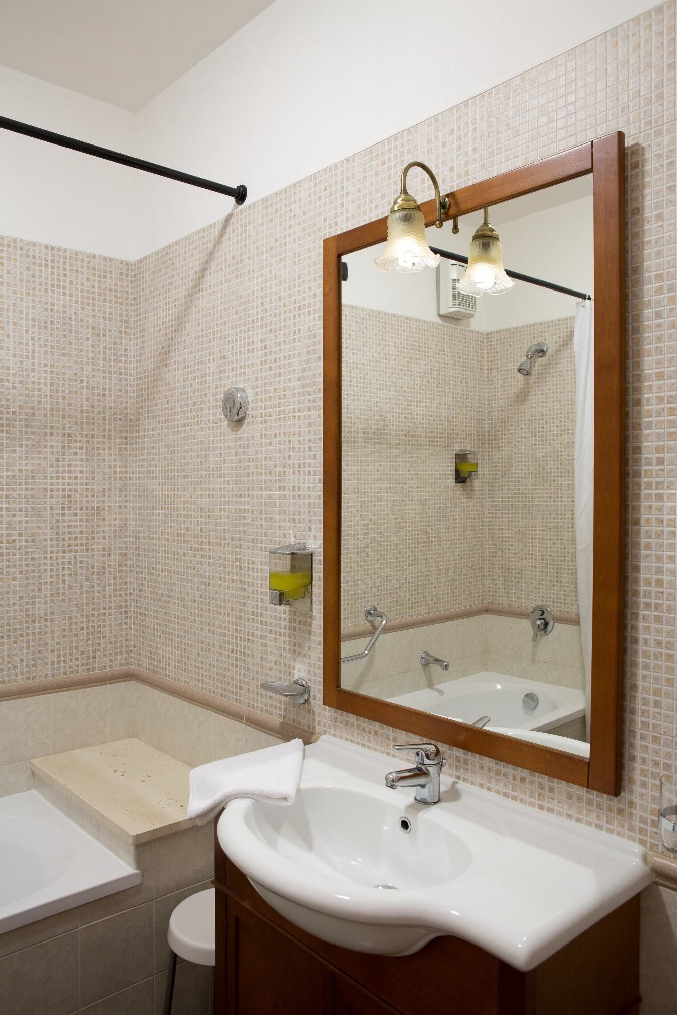 deep-soaking bathtub, hair dryer, towels