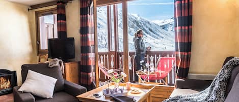 Apartment, 4 Bedrooms | Living area | Flat-screen TV