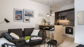 Superior Apartment, 1 Bedroom, Mountain View | Living room | Flat-screen TV