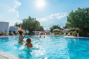 2 outdoor pools, pool umbrellas, pool loungers
