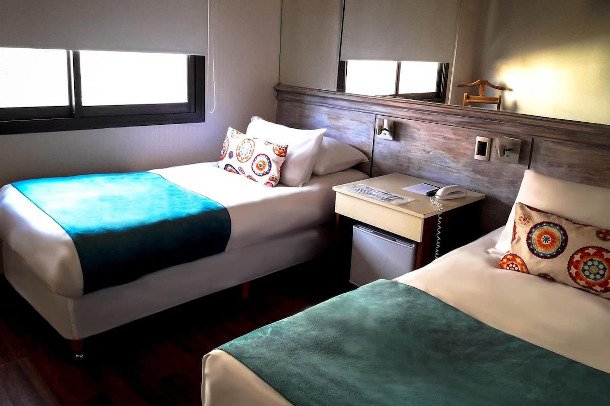 Premium bedding, down comforters, minibar, in-room safe
