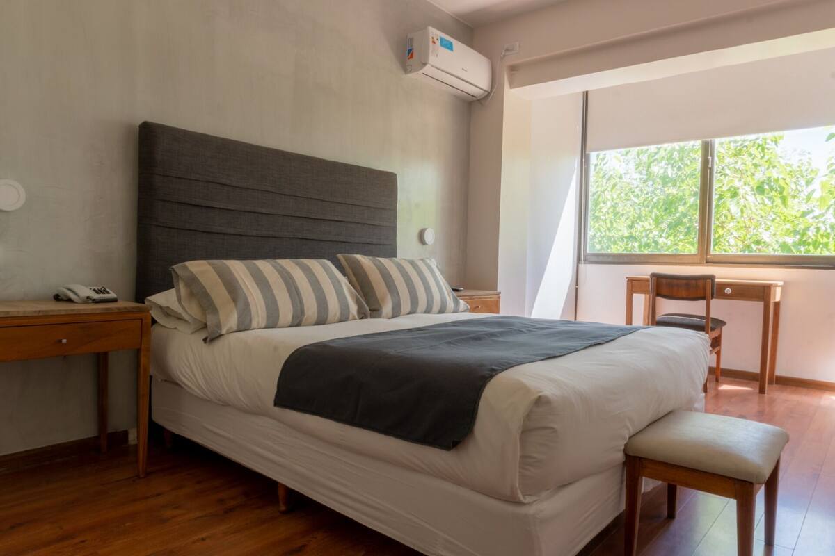 Deluxe Suite, Mountain View | Premium bedding, down comforters, minibar, in-room safe