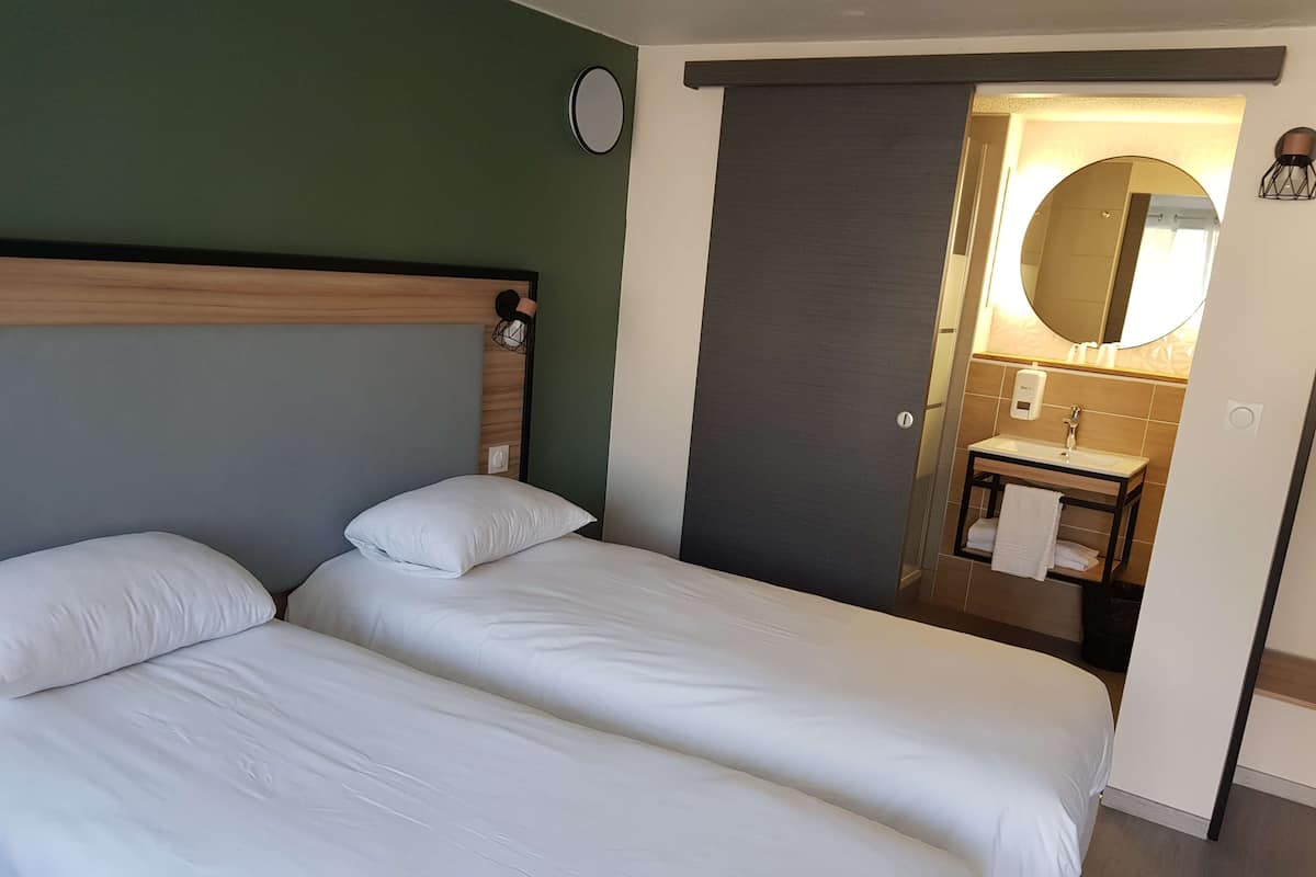Standard Room, 2 Twin Beds | Desk, laptop workspace, blackout drapes, iron/ironing board