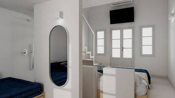 Ropa de cama hipoalergénica y caja de seguridad en la habitación